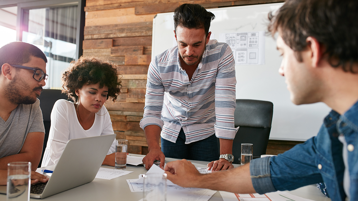 Team of roofing business employees working